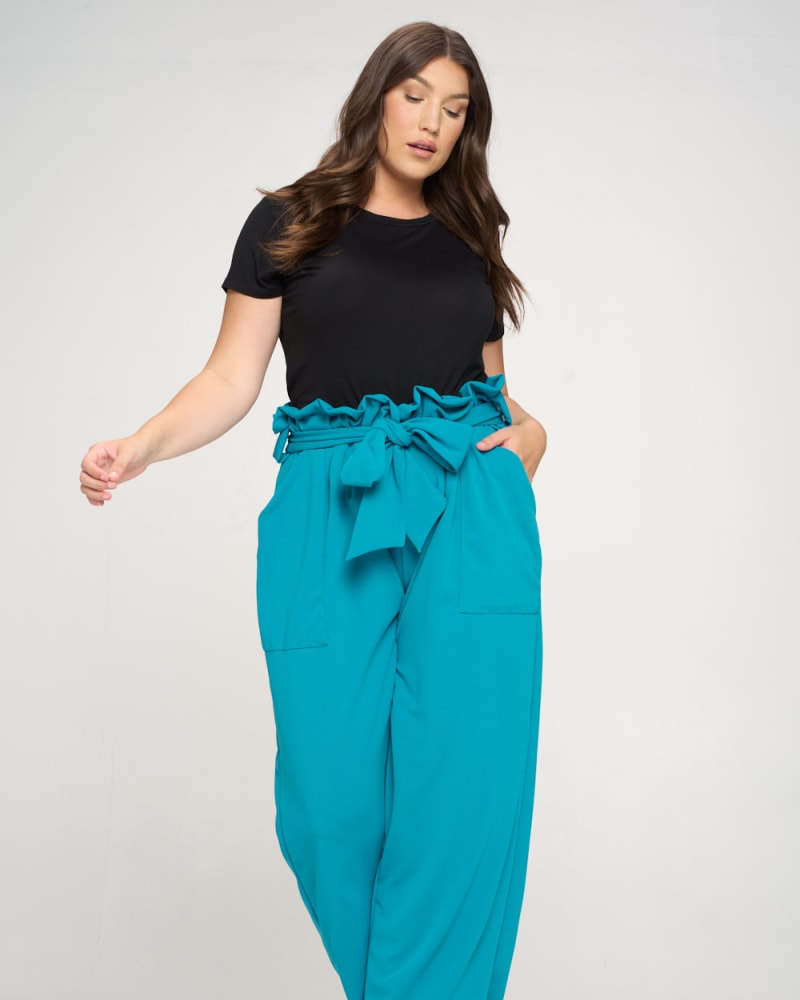 Front of a model wearing a size 1X Kathleen Paperbag Pants in Jade by L I V D. | dia_product_style_image_id:240753